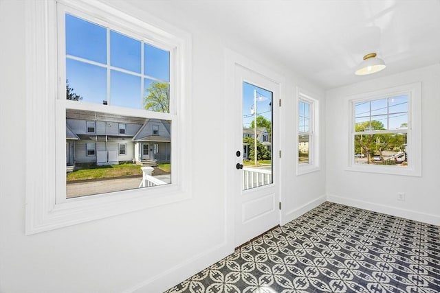 50 Mckinley St Unit 50, Maynard, MA 01754 - entryway featuring baseboards and tile patterned floors
