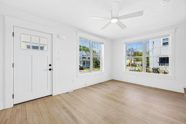 50 Mckinley St Unit 50, Maynard, MA 01754 - entryway with light wood-type flooring, a ceiling fan, and baseboards