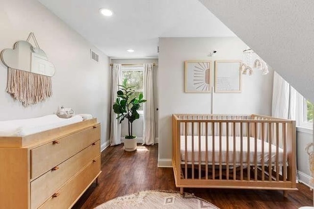 151 Whitehall Rd, Amesbury, MA 01913 - bedroom with wood finished floors, multiple windows, and recessed lighting