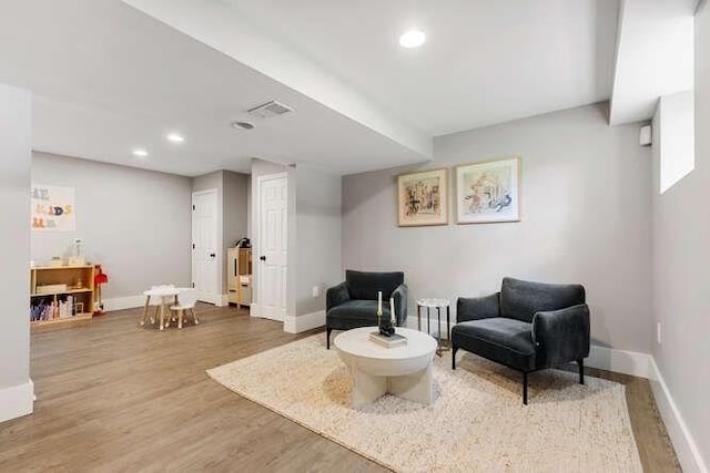 151 Whitehall Rd, Amesbury, MA 01913 - living area featuring wood finished floors and recessed lighting