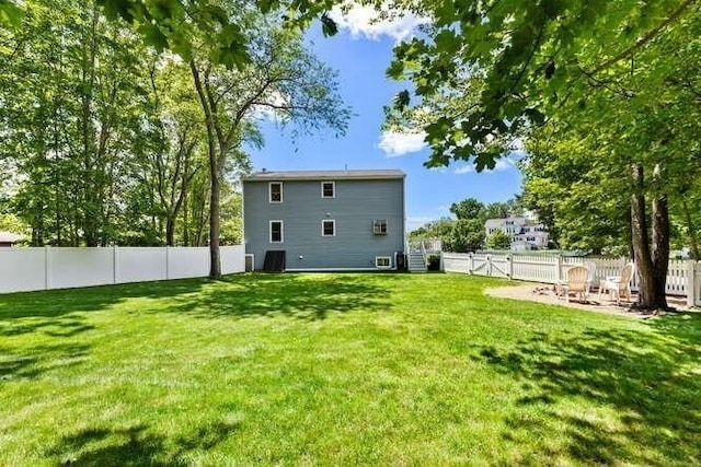 151 Whitehall Rd, Amesbury, MA 01913 - back of house featuring a fenced backyard
