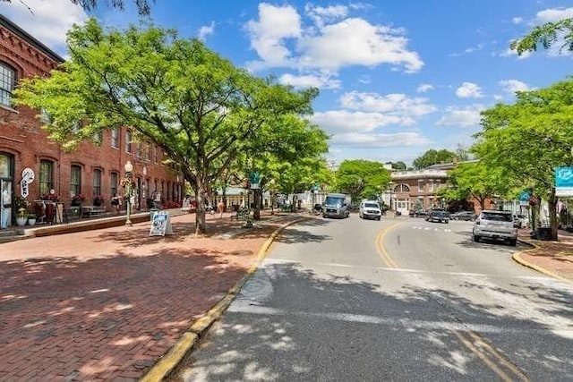 151 Whitehall Rd, Amesbury, MA 01913 - view of asphalt street featuring curbs, sidewalks, and street lighting