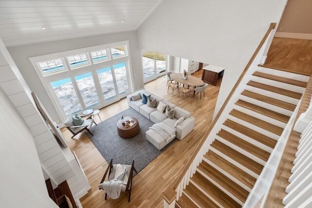 10 Dawson Way, Falmouth, MA 02536 - living area featuring stairway, wood finished floors, and high vaulted ceiling