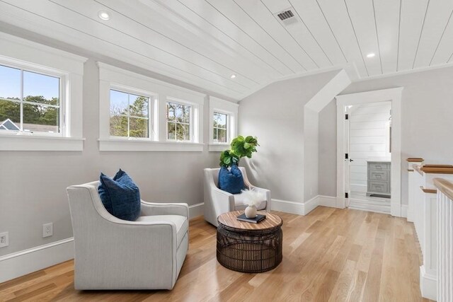10 Dawson Way, Falmouth, MA 02536 - living area with wood finished floors, baseboards, vaulted ceiling, and recessed lighting