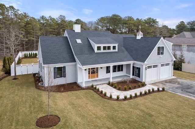 10 Dawson Way, Falmouth, MA 02536 - shingle-style home with asphalt driveway, a chimney, roof with shingles, covered porch, and a garage