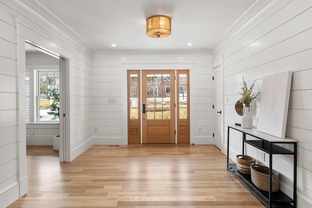 10 Dawson Way, Falmouth, MA 02536 - foyer entrance featuring ornamental molding, light wood-type flooring, and wooden walls