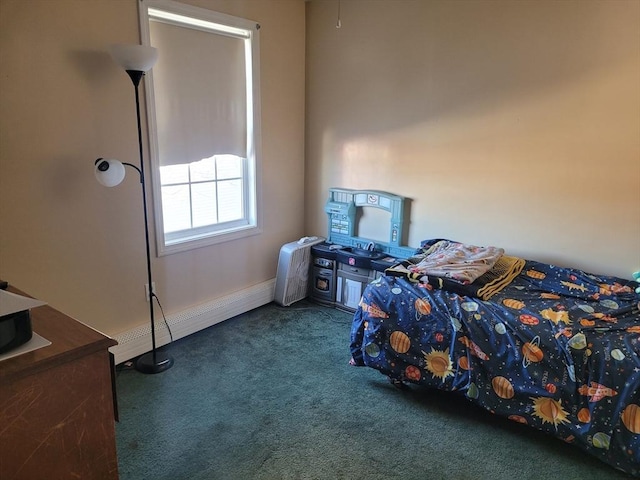 bedroom featuring a baseboard heating unit and dark colored carpet