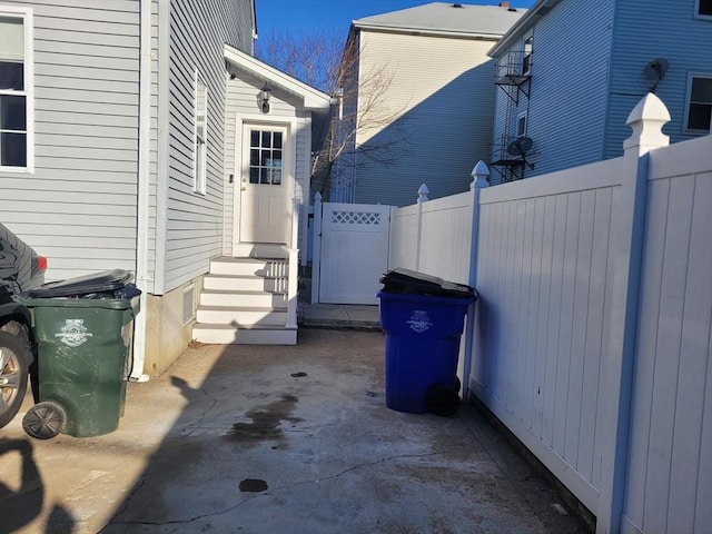 view of side of property featuring a patio area