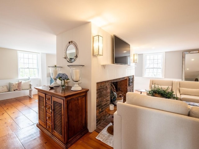 205 Powder Point Ave, Duxbury, MA 02332 - living room with hardwood / wood-style floors and a fireplace