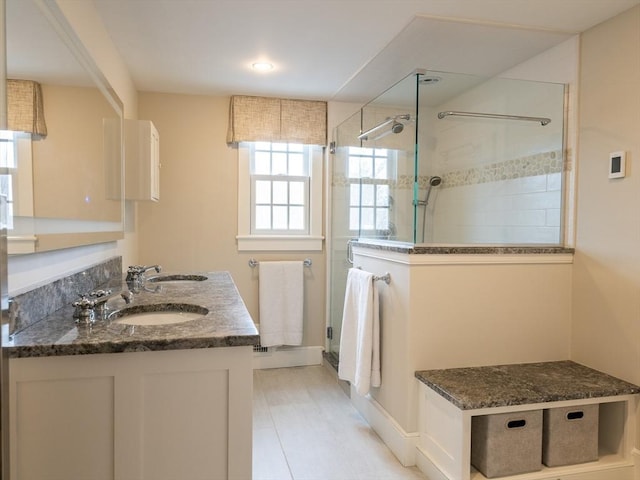 205 Powder Point Ave, Duxbury, MA 02332 - full bath featuring double vanity, a sink, and a shower stall