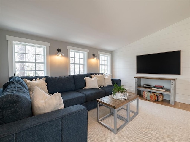 205 Powder Point Ave, Duxbury, MA 02332 - living area with plenty of natural light, vaulted ceiling, and wood finished floors