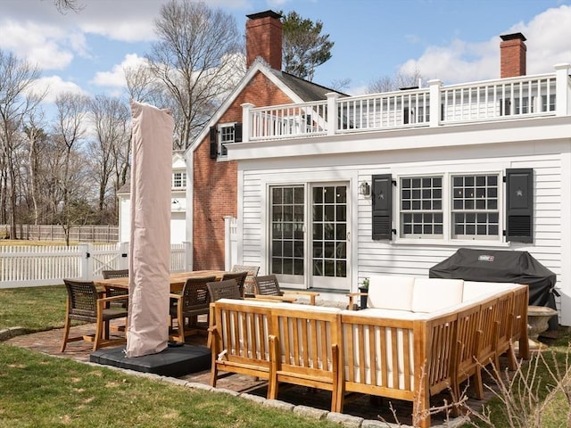 205 Powder Point Ave, Duxbury, MA 02332 - rear view of house featuring a balcony, a chimney, an outdoor hangout area, and fence