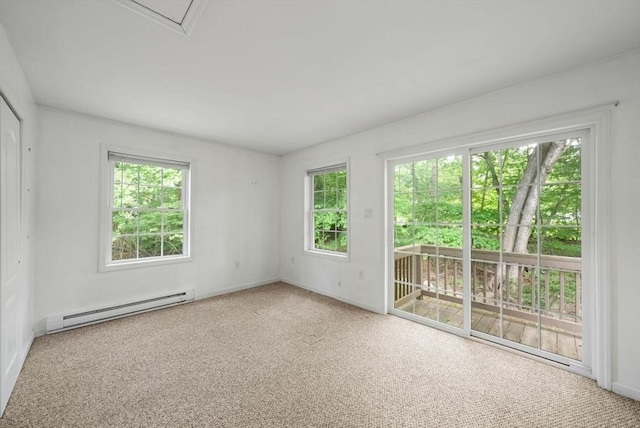 52 Richard Rd, Hanson, MA 02341 - carpeted empty room featuring a baseboard heating unit and baseboards