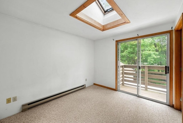 52 Richard Rd, Hanson, MA 02341 - empty room featuring a skylight, baseboard heating, and light carpet