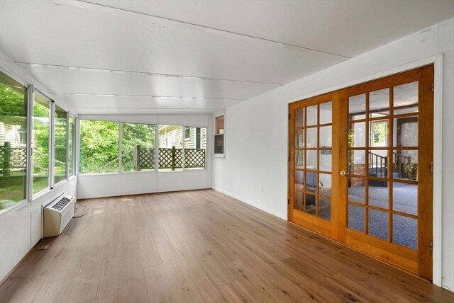 52 Richard Rd, Hanson, MA 02341 - unfurnished sunroom with french doors and a wall mounted AC