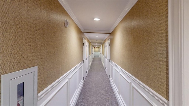 hall featuring carpet floors, ornamental molding, wainscoting, and recessed lighting