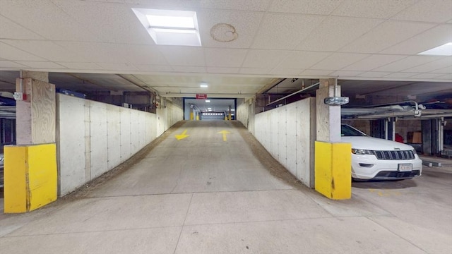 parking deck featuring wooden walls