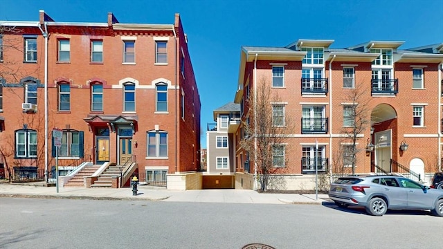 view of front of house with brick siding