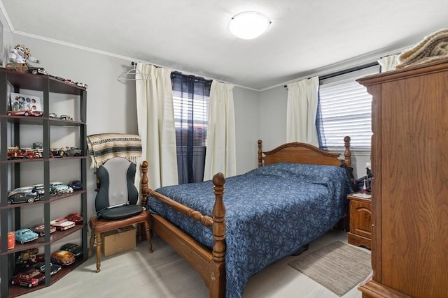 bedroom with ornamental molding