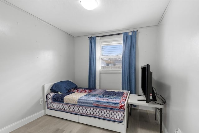 bedroom featuring light wood-type flooring