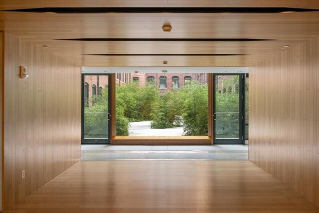 doorway to outside featuring plenty of natural light