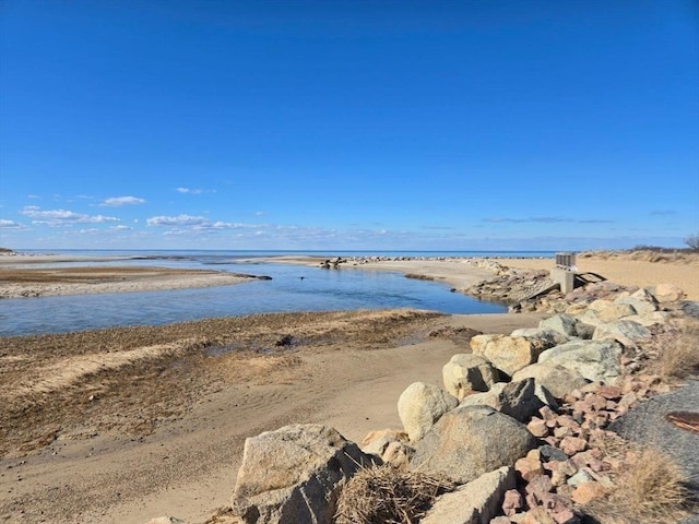 view of water feature with a beach view