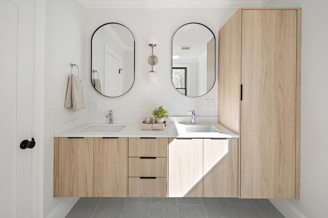 133 Fayerweather St Unit 1, Cambridge, MA 02138 - bathroom featuring double vanity and crown molding