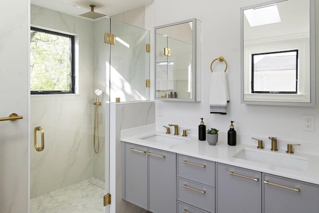133 Fayerweather St Unit 1, Cambridge, MA 02138 - bathroom with a marble finish shower and double vanity