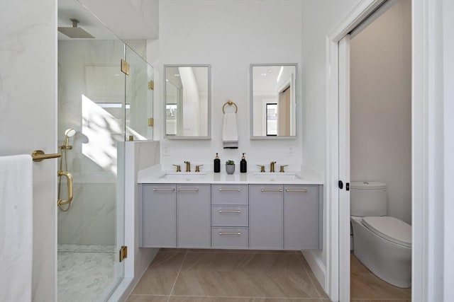 133 Fayerweather St Unit 1, Cambridge, MA 02138 - bathroom featuring a marble finish shower and double vanity