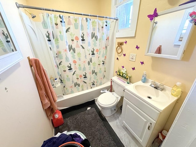 full bath featuring shower / bath combo with shower curtain, toilet, and vanity