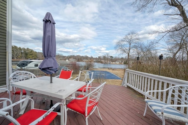 deck featuring a water view