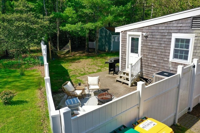 155 Great Marsh Rd, Barnstable, MA 02632 - deck featuring area for grilling, a patio, entry steps, and an outdoor living space with a fire pit