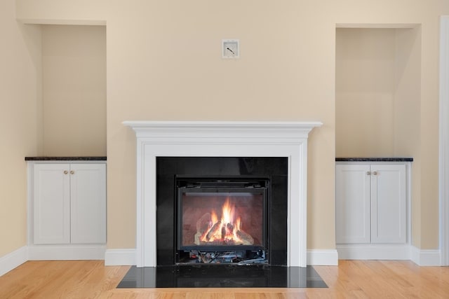 interior details featuring hardwood / wood-style floors