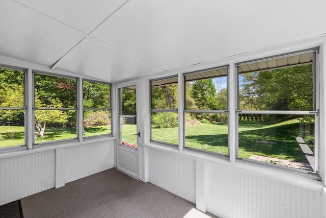 unfurnished sunroom featuring radiator