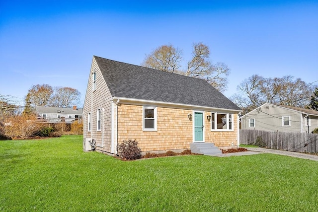 view of front of home with a front yard