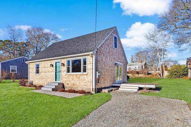 bungalow-style house with a front yard