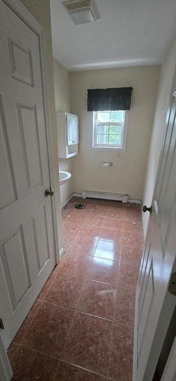 75 Downey Rd, North Brookfield, MA 01535 - bathroom featuring tile patterned floors and a baseboard heating unit