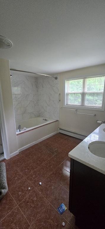 75 Downey Rd, North Brookfield, MA 01535 - bathroom featuring vanity, tile patterned floors, a baseboard heating unit, and washtub / shower combination
