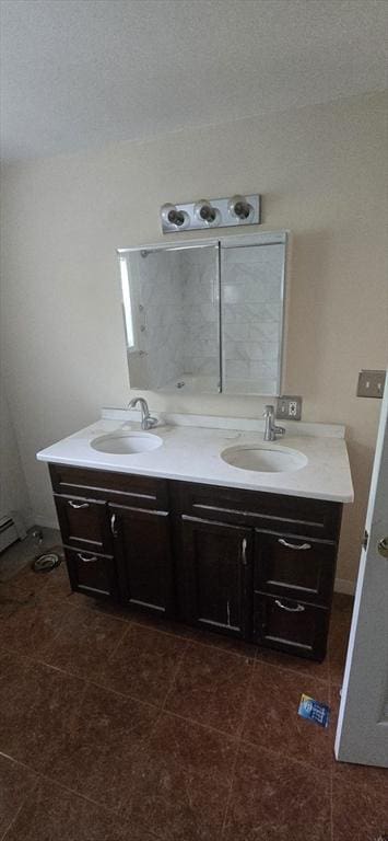 75 Downey Rd, North Brookfield, MA 01535 - full bathroom with double vanity and tile patterned floors