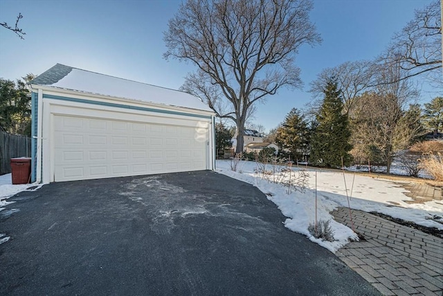 view of snow covered garage