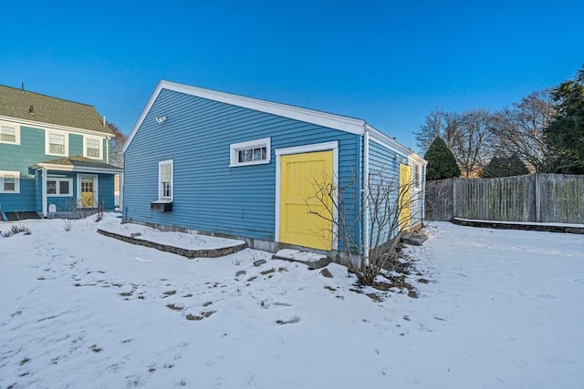 view of snow covered property