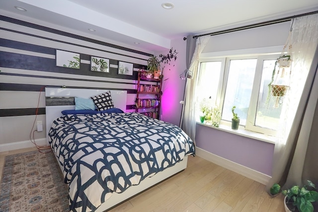 bedroom featuring hardwood / wood-style floors