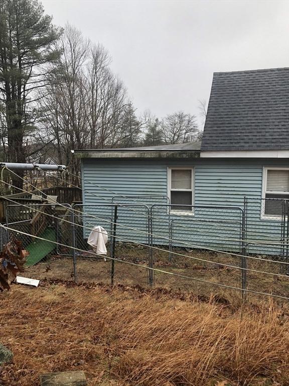 266 Pleasant St, Franklin, MA 02038 - view of property exterior with a shingled roof