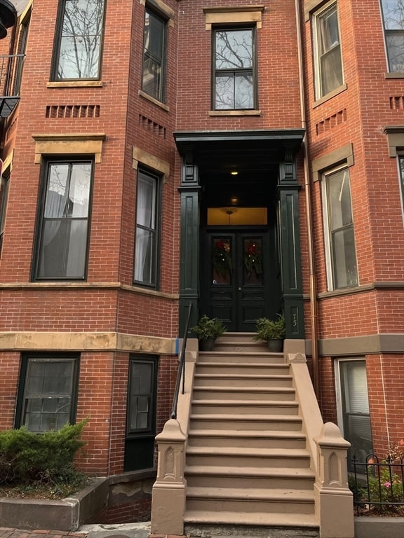 property entrance featuring french doors