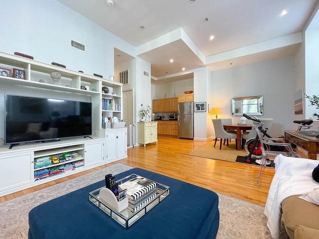 living area featuring light wood-style flooring