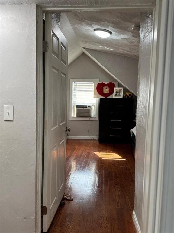 335 Euclid Ave, Lynn, MA 01904 - hall featuring dark wood-style floors, vaulted ceiling, cooling unit, and baseboards