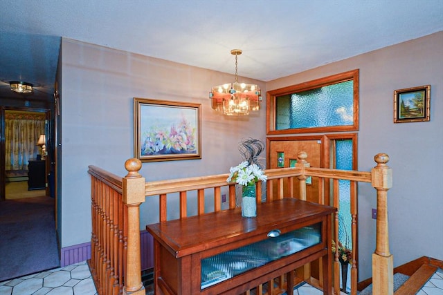 carpeted dining room featuring a chandelier