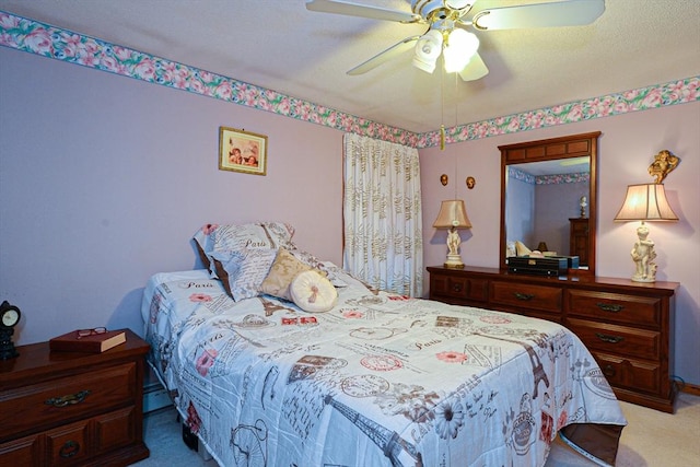 carpeted bedroom with a ceiling fan