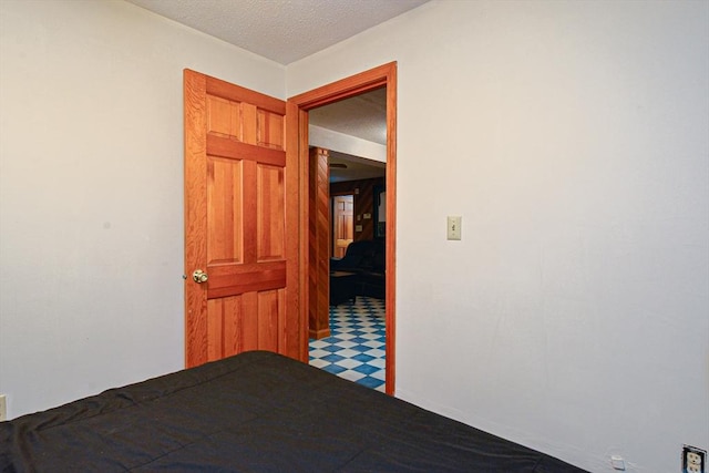 bedroom with a textured ceiling