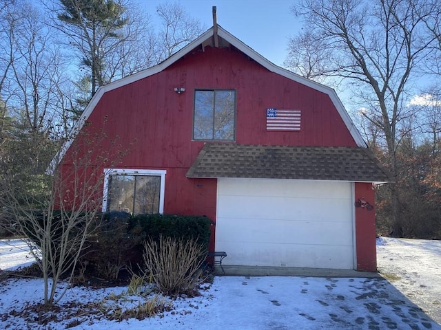 view of snow covered garage